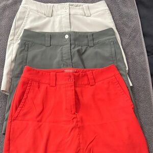 Nike Women’s Red, Gray, and Beige Golf Skirts Trio.